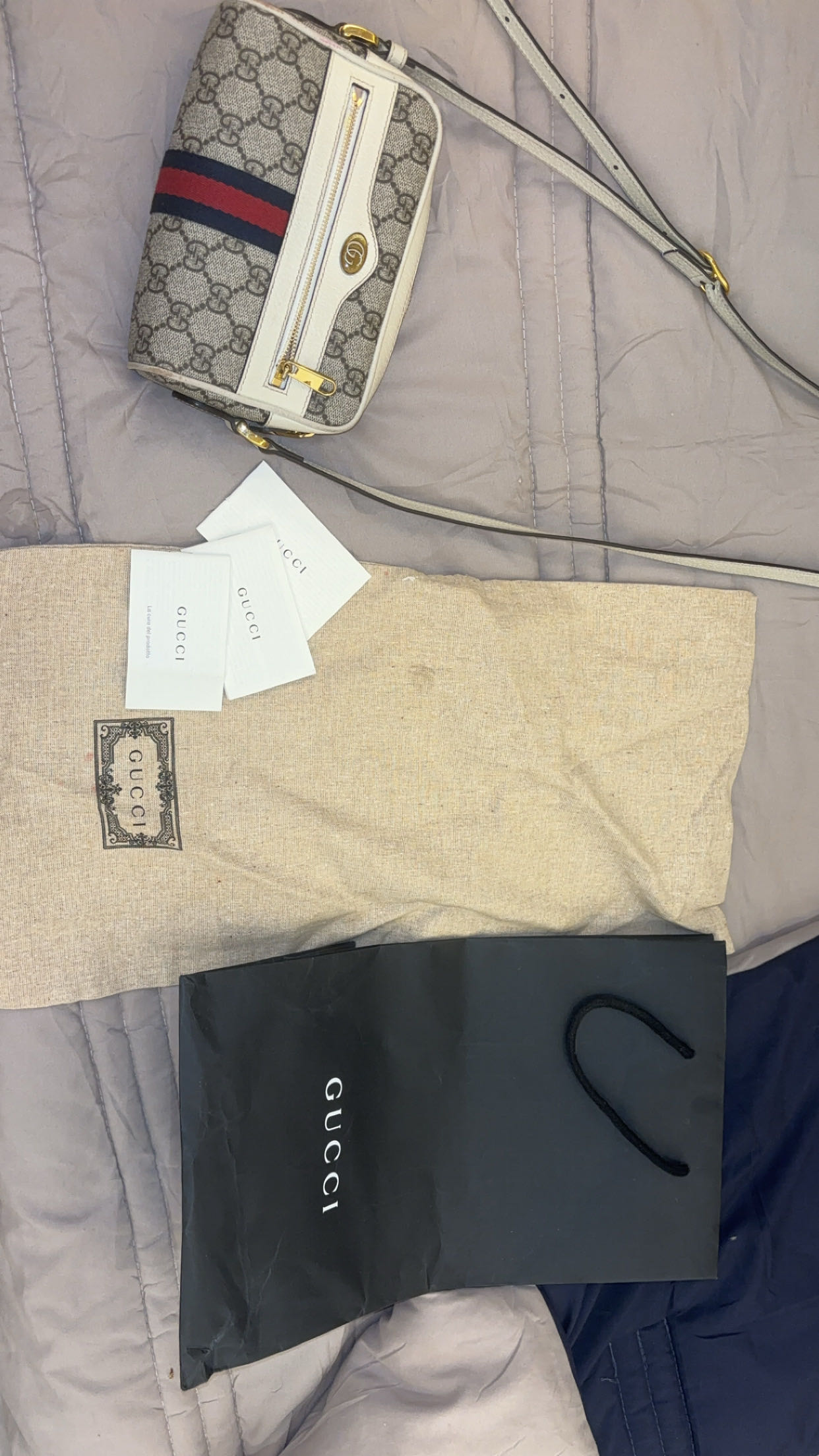 شنطة قوتشي الاصلية