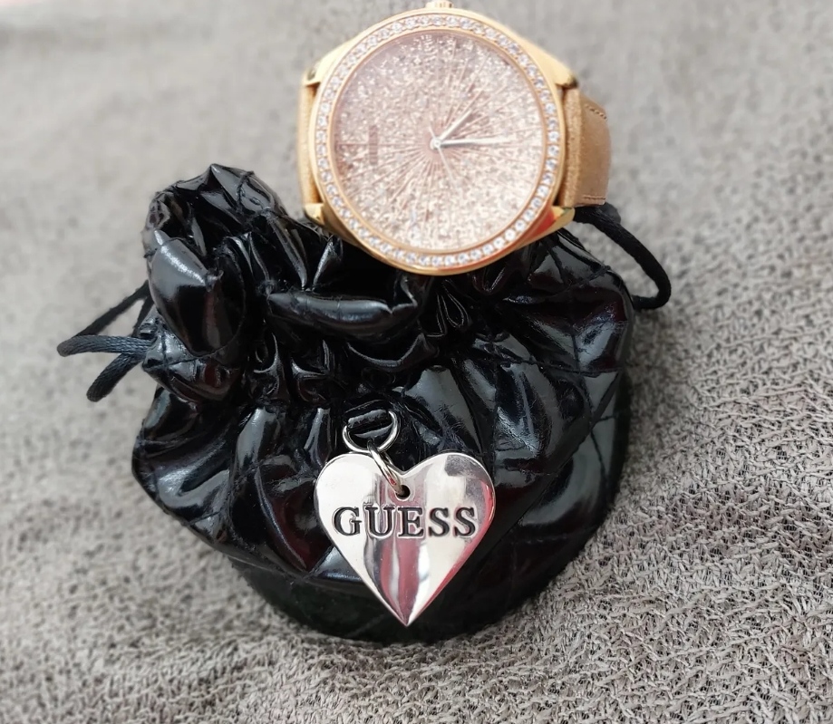 ساعه جييس  برونز  حجم دائري كبير  مع حقيبه