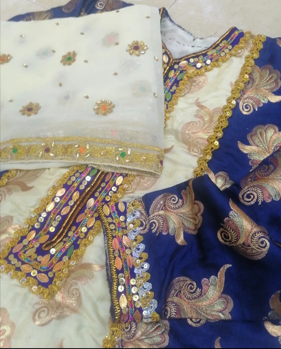 لبسة عماني تقليدي... عمل يدوي