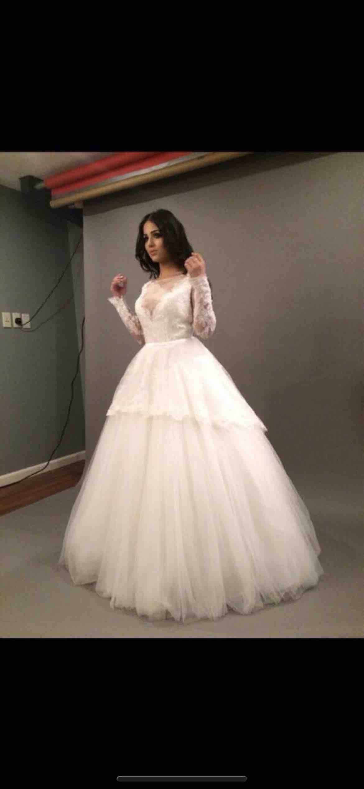 فستان زفاف كلفني ٥٠٠٠ الاف